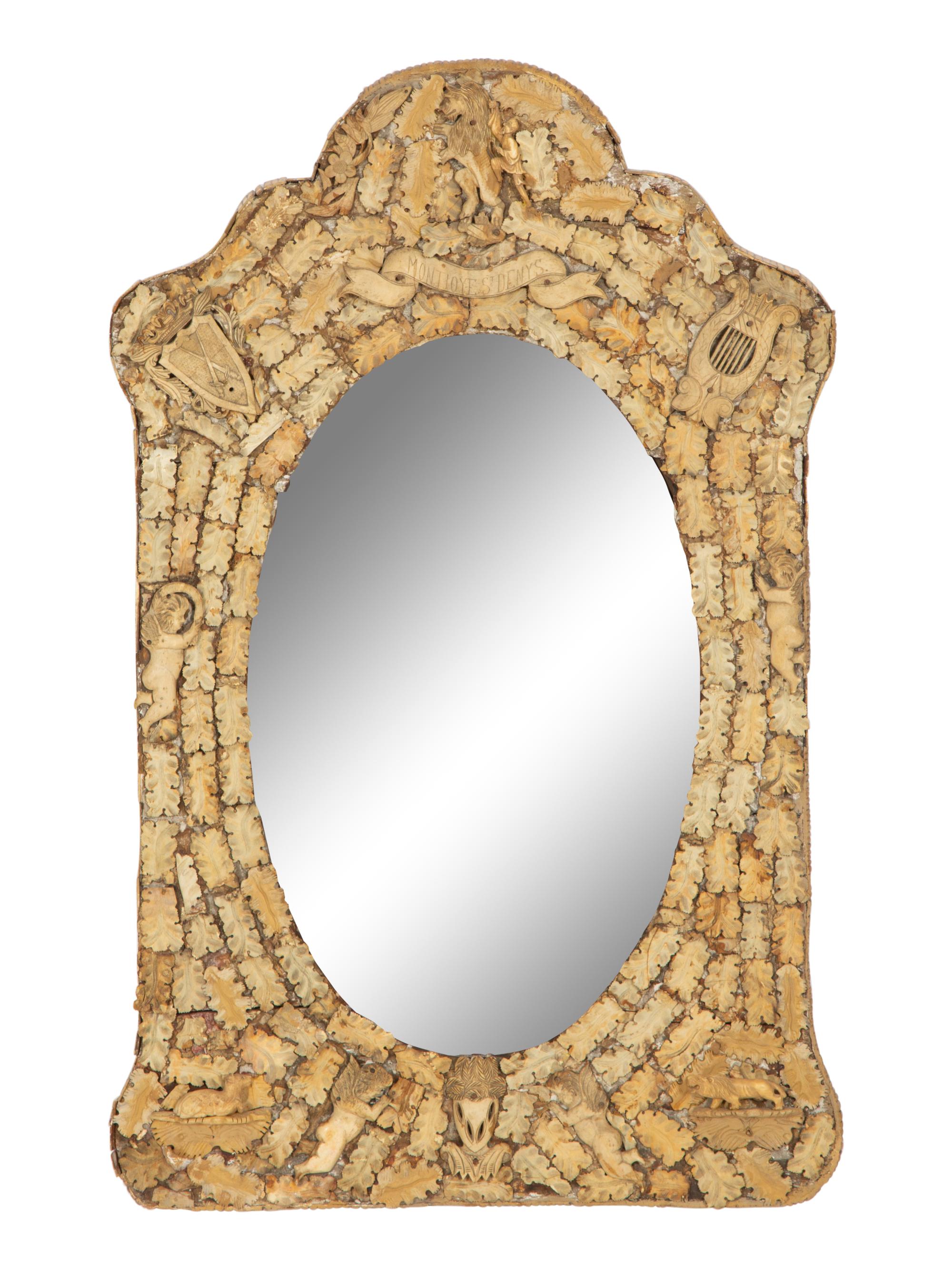 A Continental Carved Bone Mirror