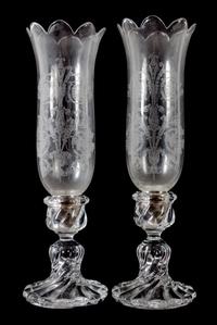 A Pair of Swirled Molded Glass Candlesticks with Hurricane Shades Height 16 inches. — 20TH CENTURY