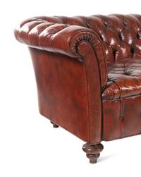 A Leather-Upholstered Chesterfield Sofa