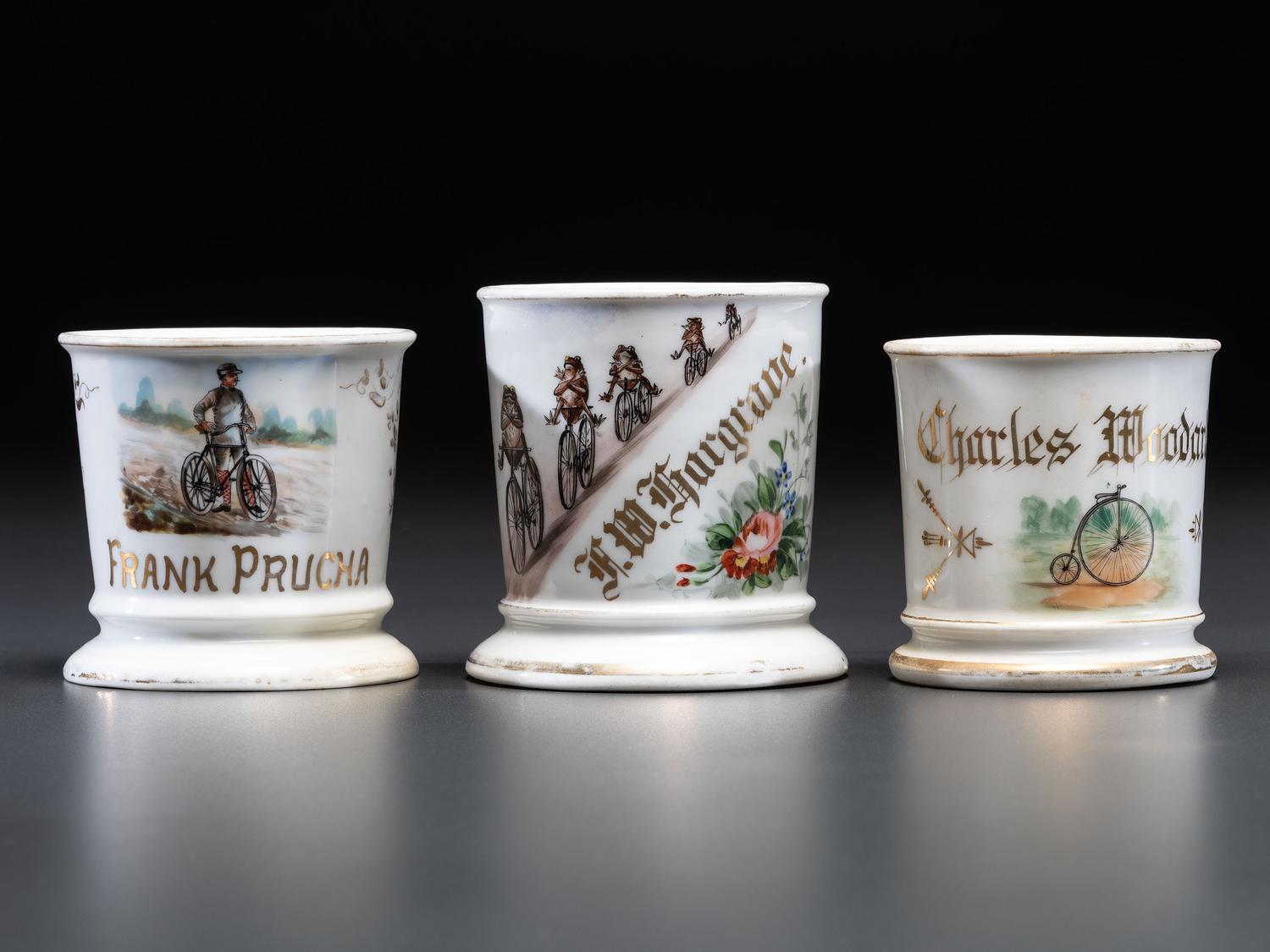 Three Cyclist's Porcelain Shaving Mugs