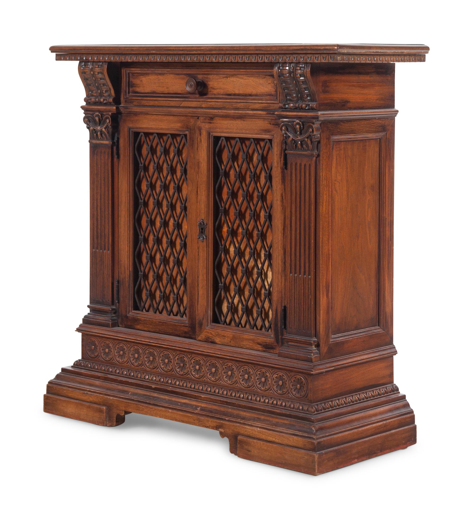 An Italian Baroque Style Walnut Cabinet