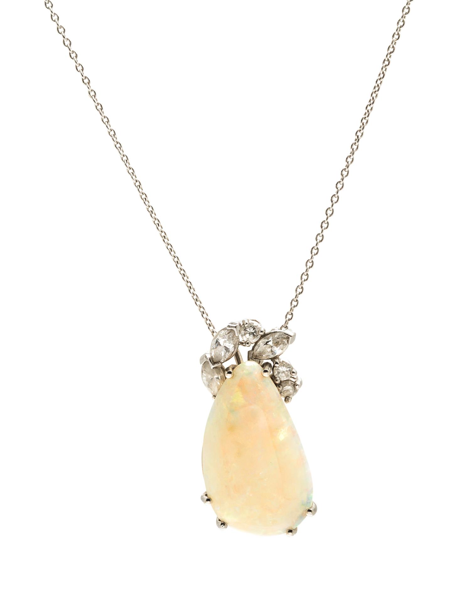 A White Gold, Opal and Diamond Pendant, 4.40 dwts.