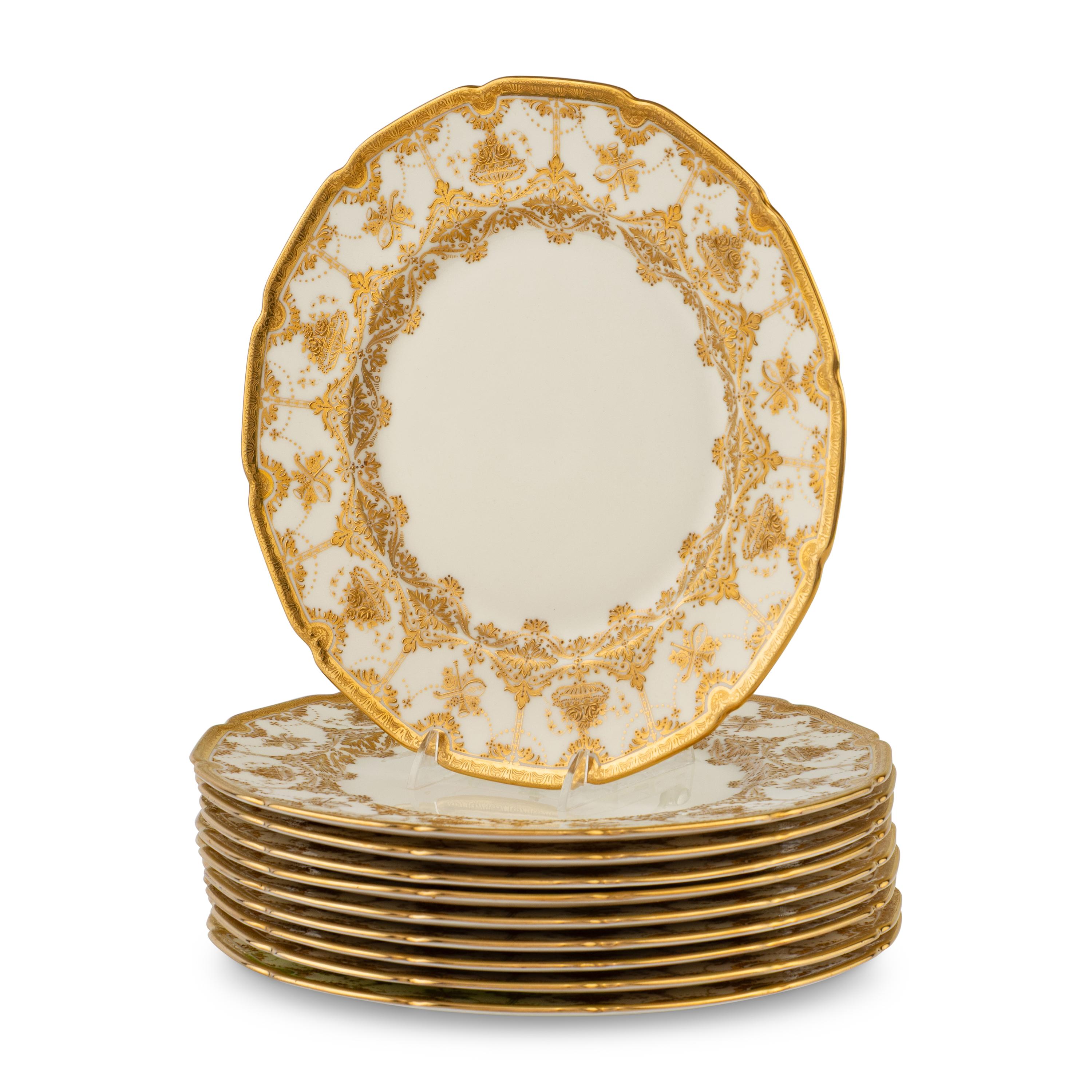 A Set of Ten Royal Doulton Gilt Decorated Porcelain Service Plates