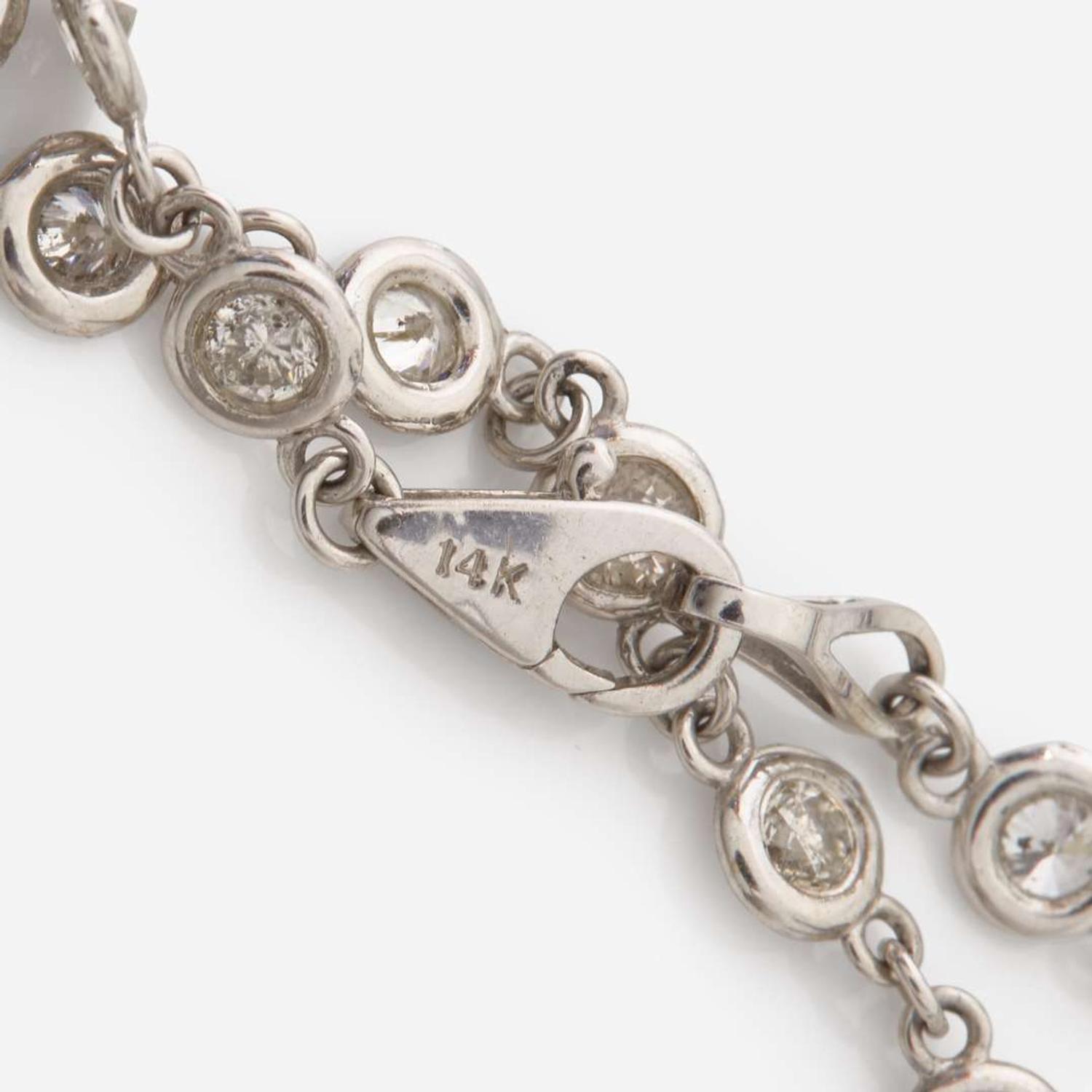 A 14K White Gold, Platinum, Diamond, and Onyx Necklace