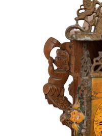 A Dutch Carved and Painted Wall Clock