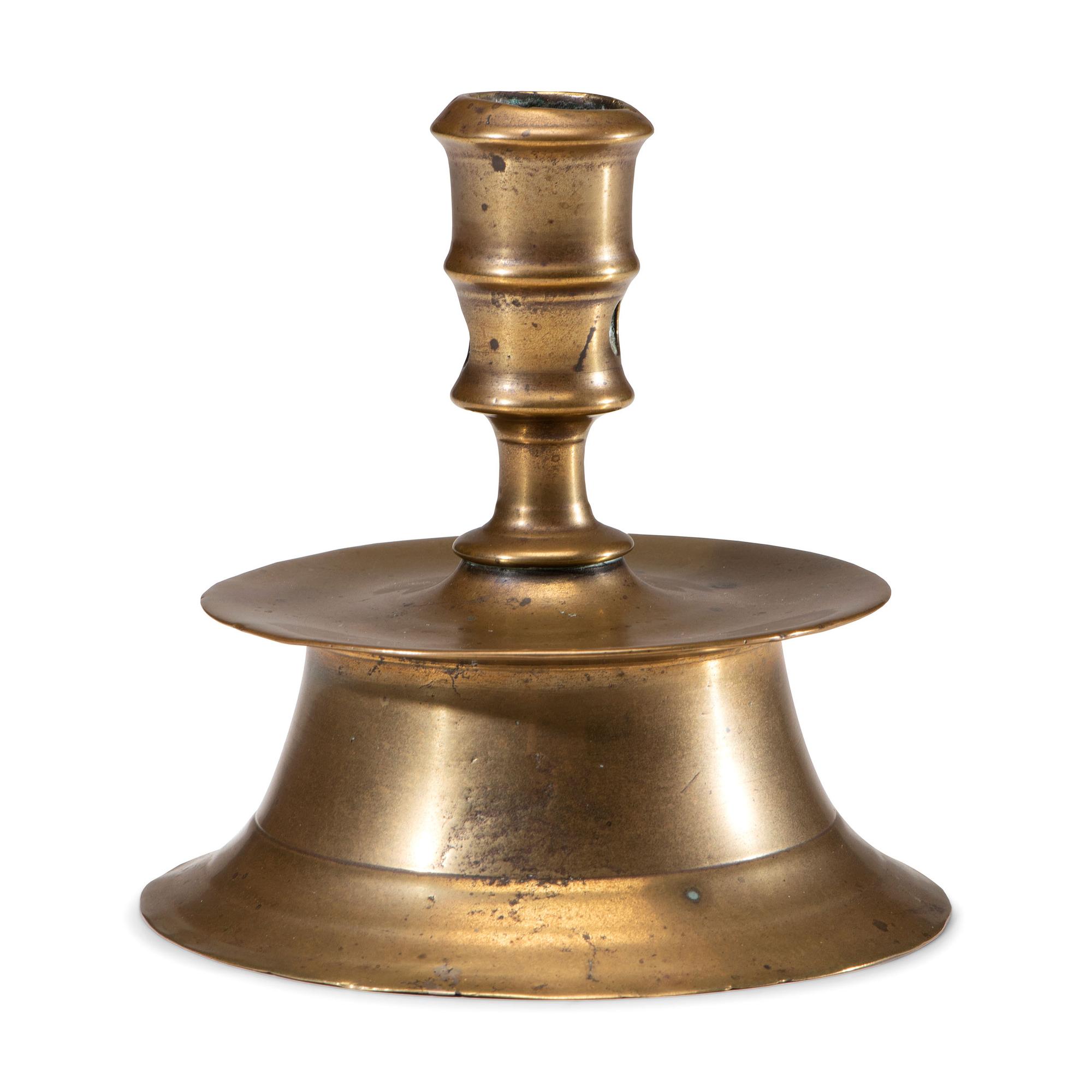 A Dutch Brass Heemskirk Candlestick