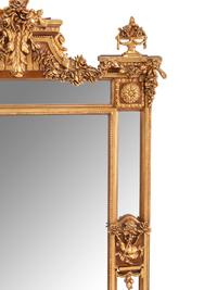 A Pair of Louis XVI Style Gilt Composition Mirrors