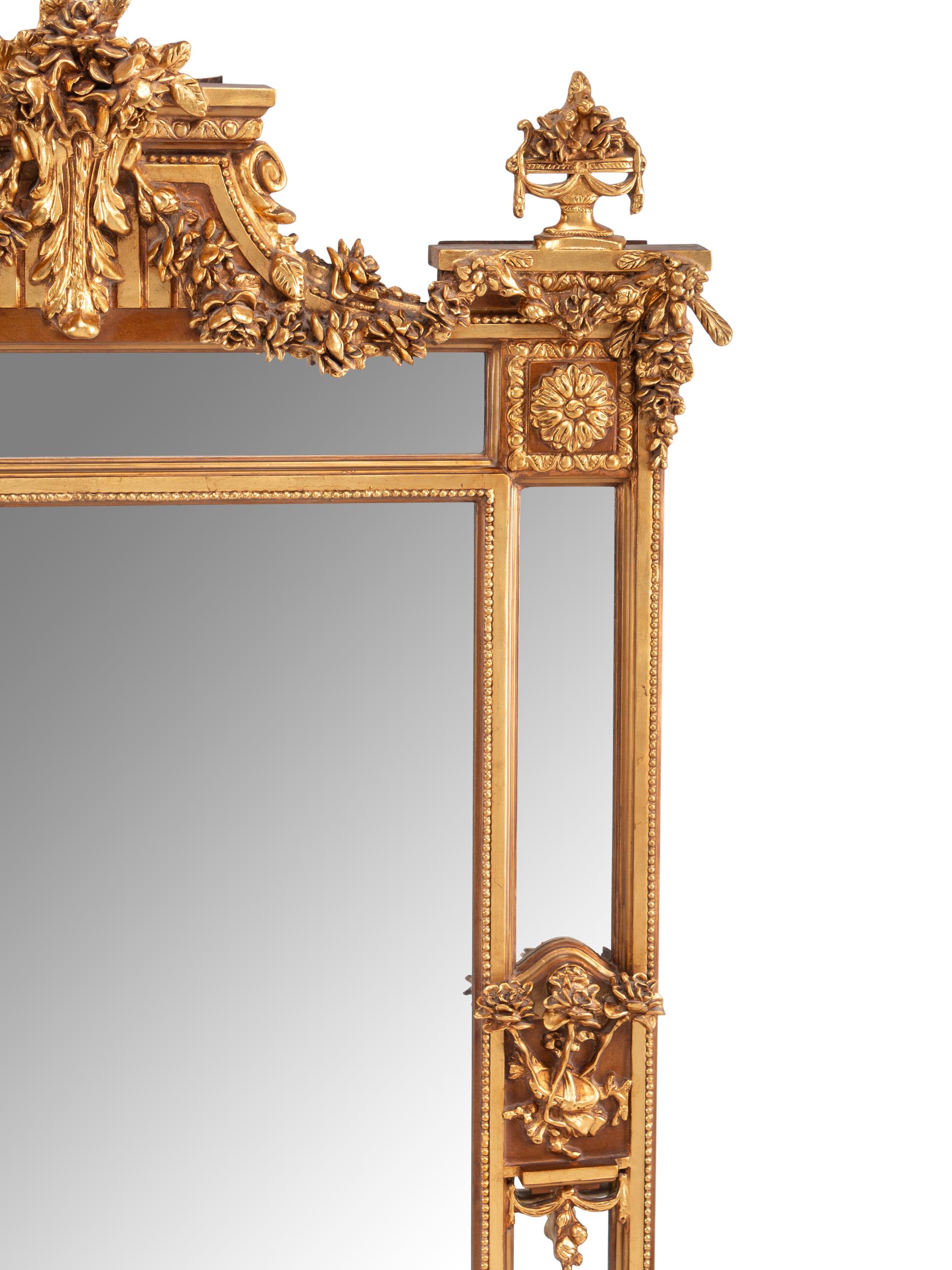 A Pair of Louis XVI Style Gilt Composition Mirrors