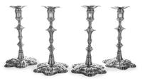 A Set of Four George II Silver Candlesticks, John Cafe, London, 1752, each having a candle cup surmounting a foliate and knopped stem a