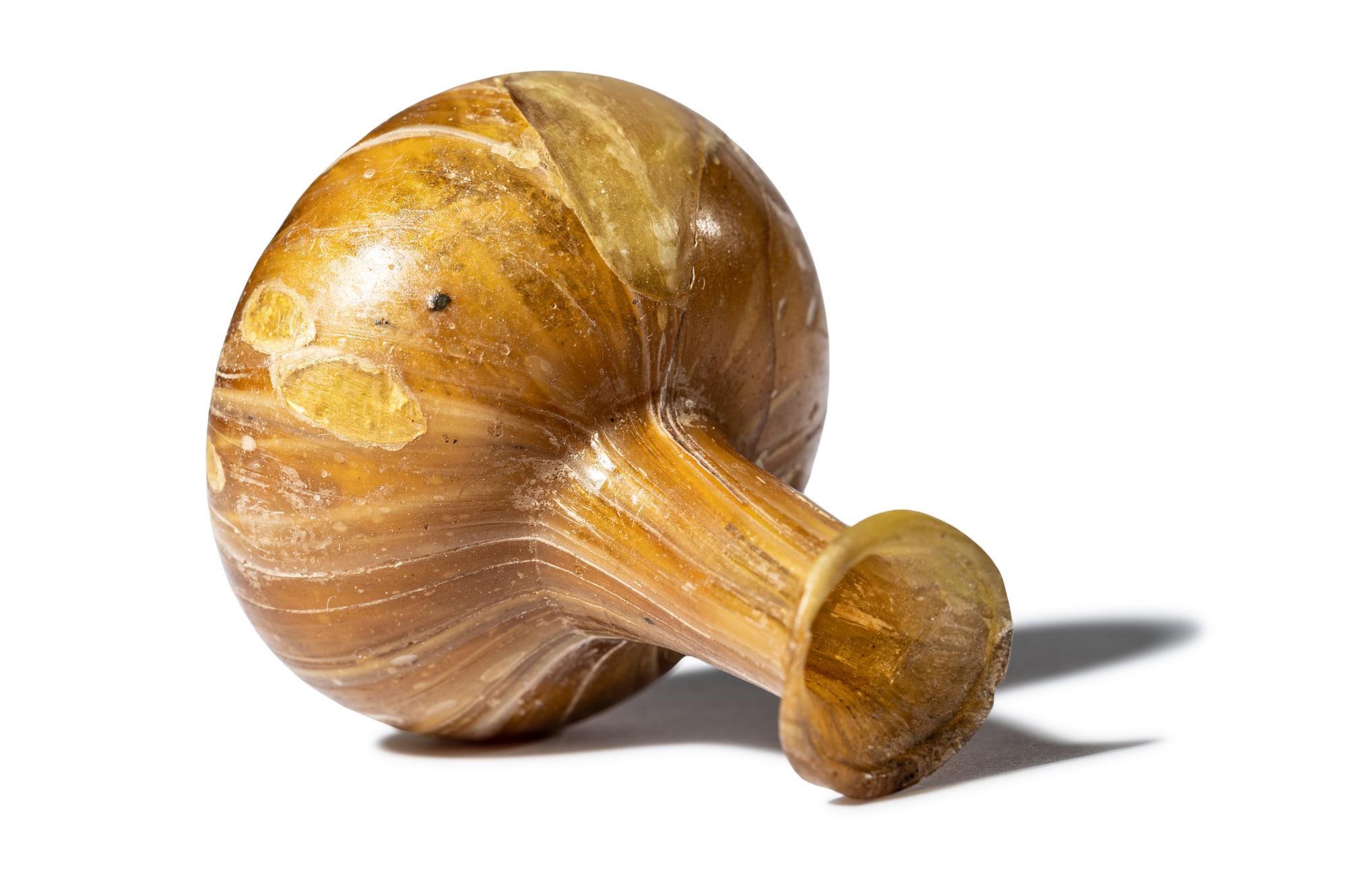 A Roman Marbled Yellow Glass Bottle