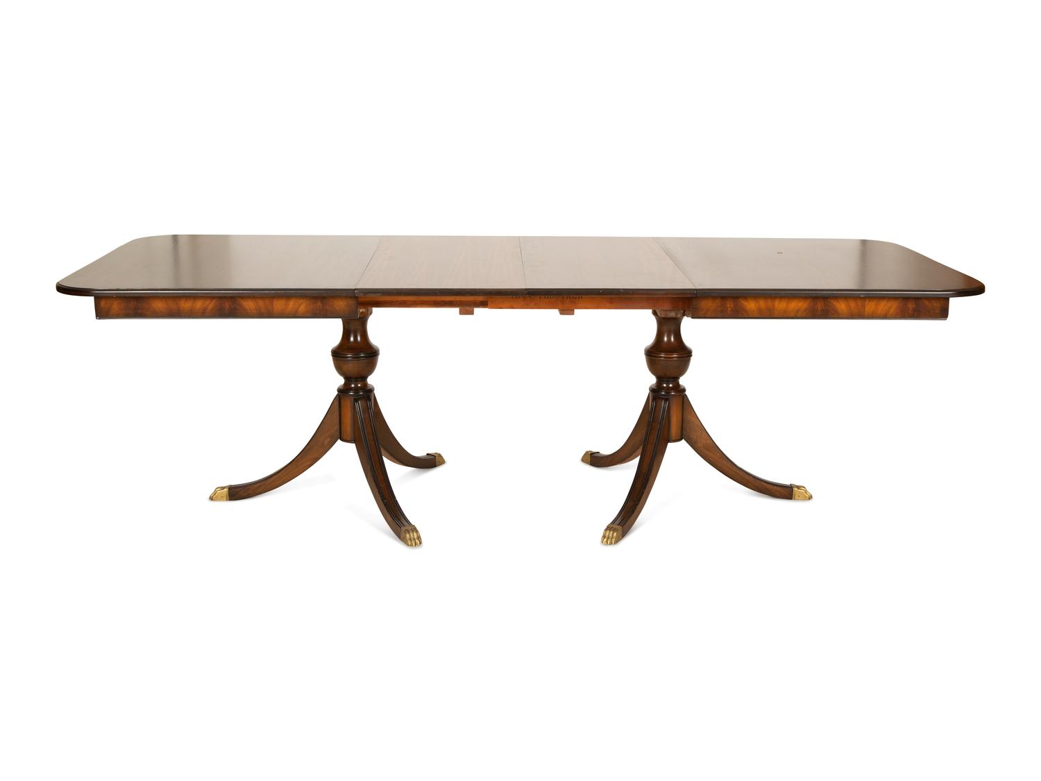 A Regency Style Mahogany Two Pedestal Dining Table — 20th Century