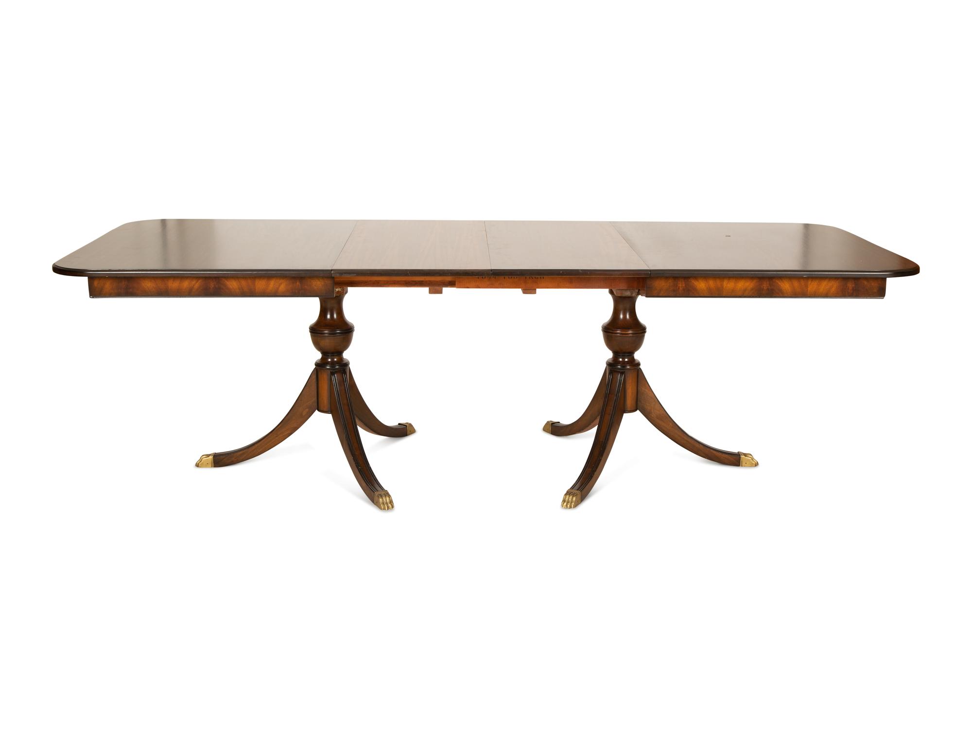 A Regency Style Mahogany Two Pedestal Dining Table — 20th Century