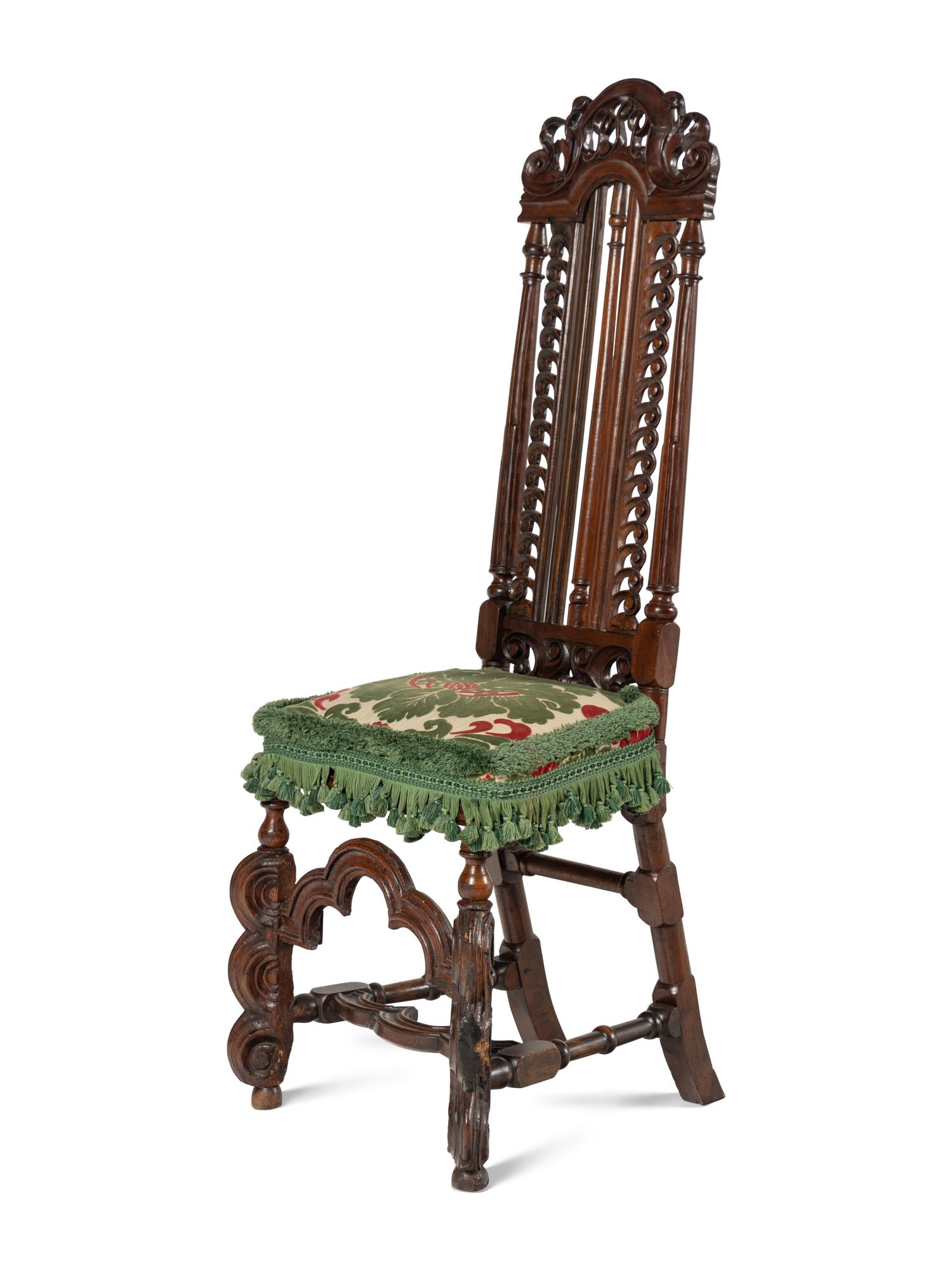 A Pair of William and Mary Style Carved Walnut Side Chairs