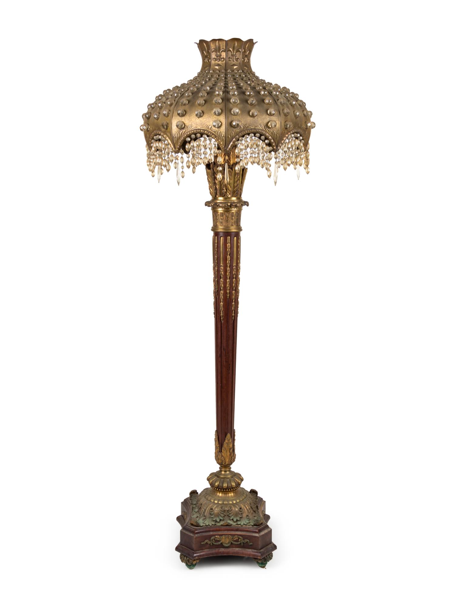 A Gilt Metal and Glass Floor Lamp