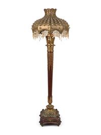 A Gilt Metal and Glass Floor Lamp