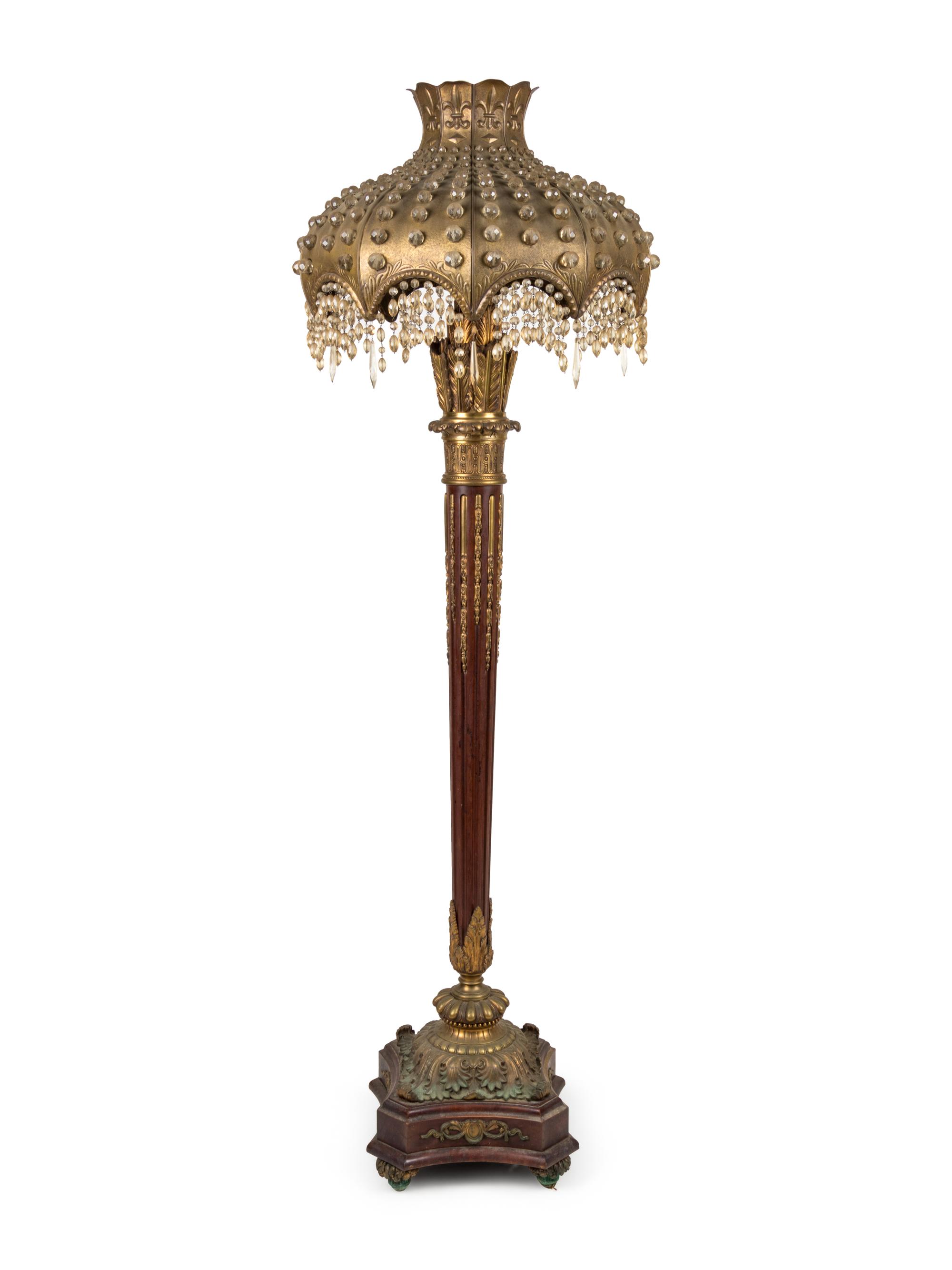A Gilt Metal and Glass Floor Lamp