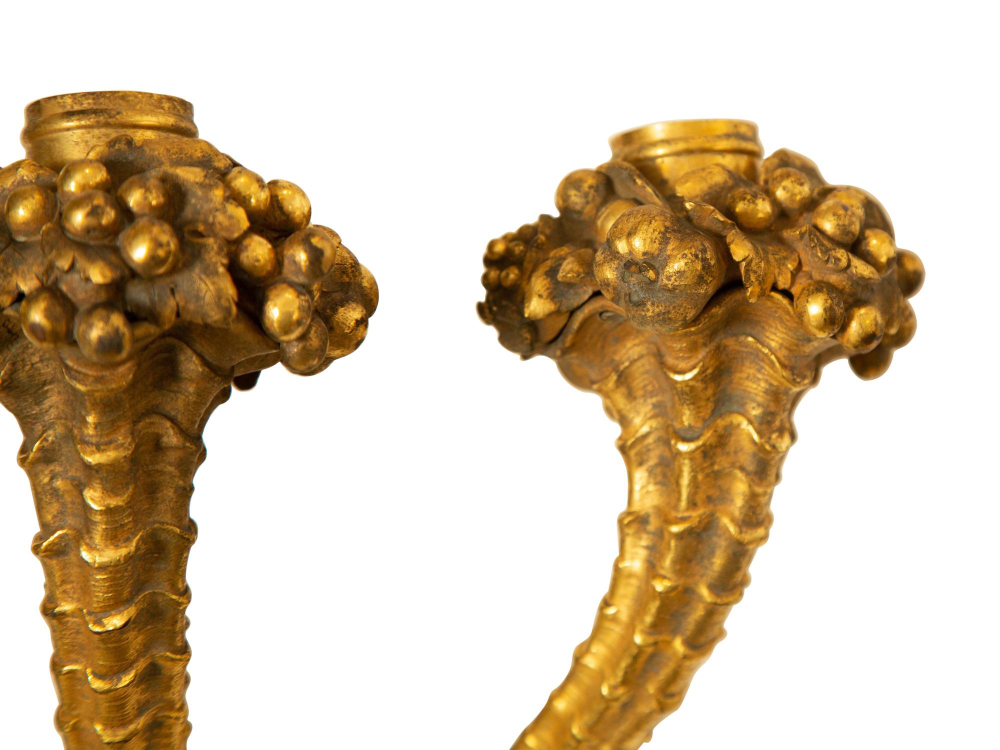 A Pair of French Gilt Bronze Three-Light Sconces