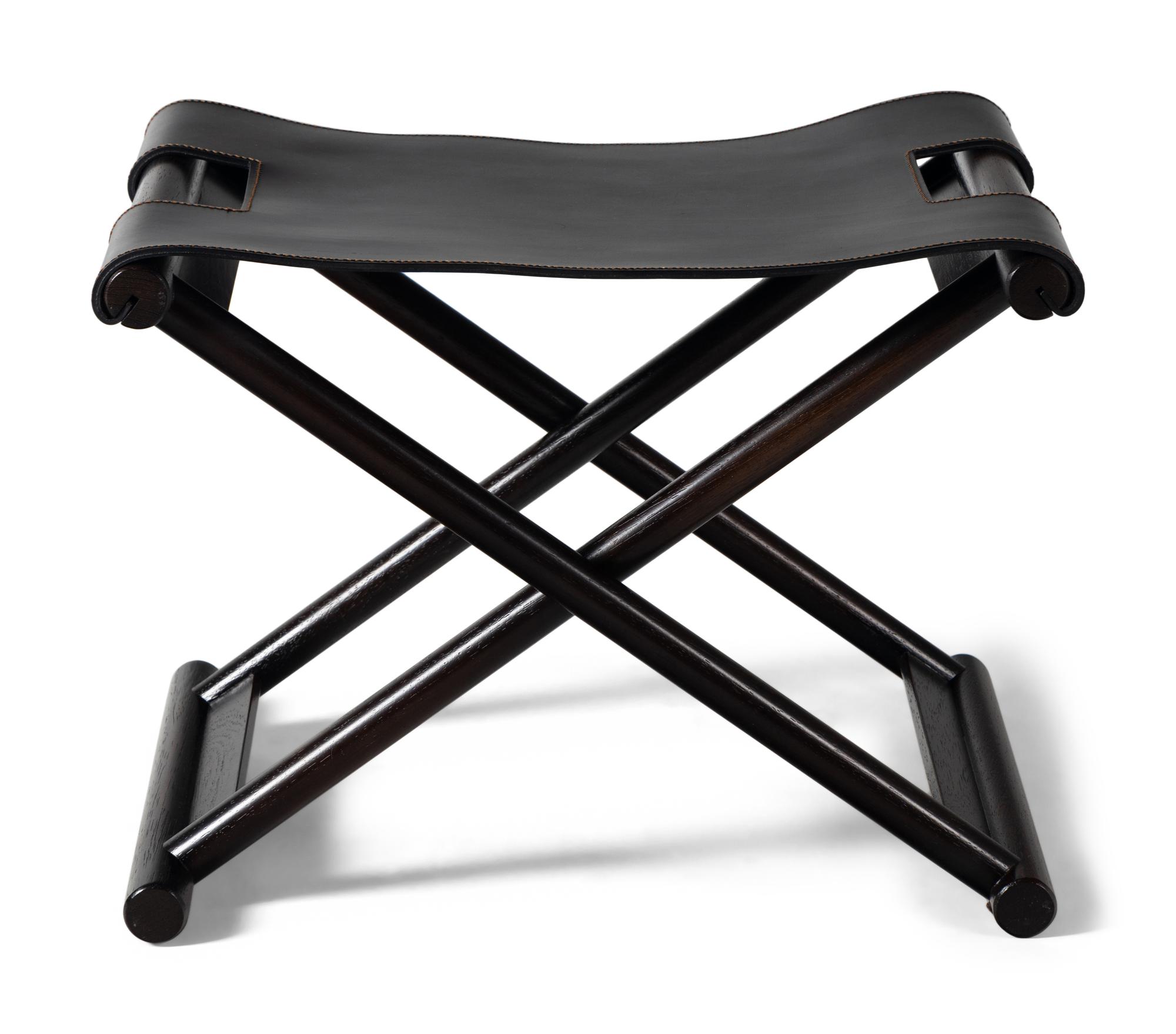 A Contemporary Leather-Upholstered X-Form Stool