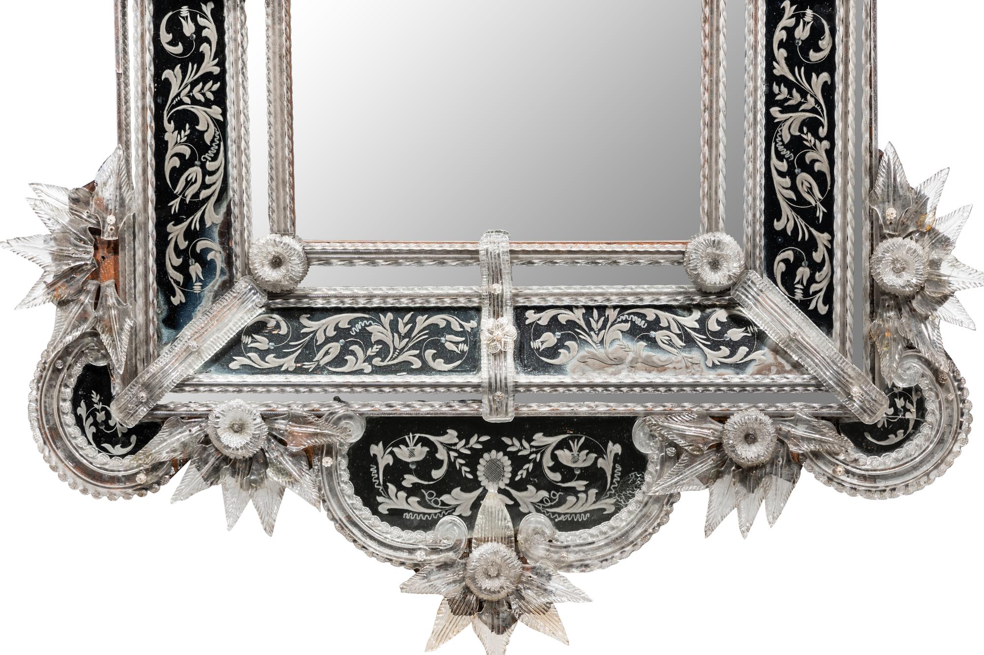 A Venetian Blown and Etched Glass Mirror