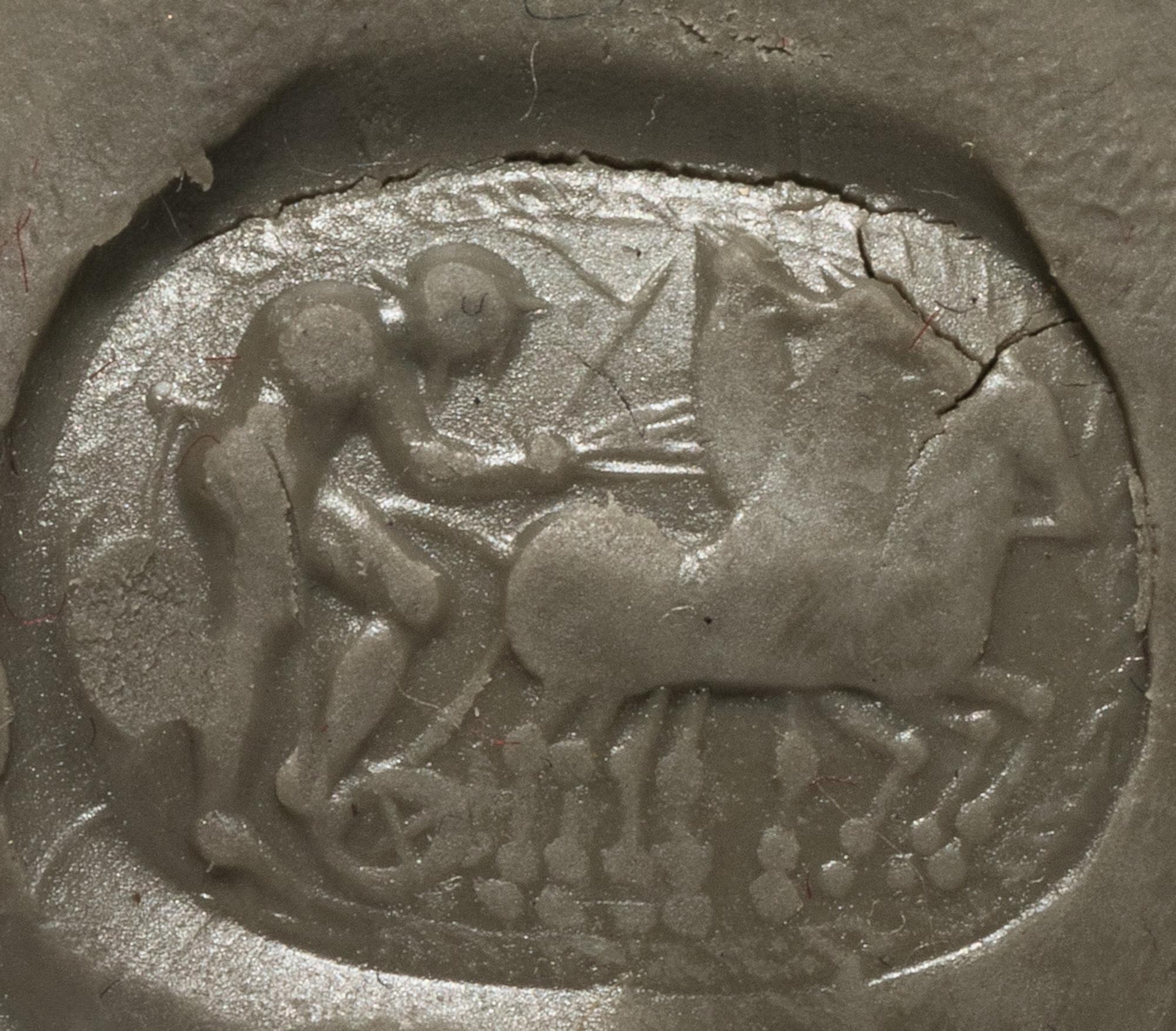 An Etruscan Carnelian Scarab with a Quadriga Chariot