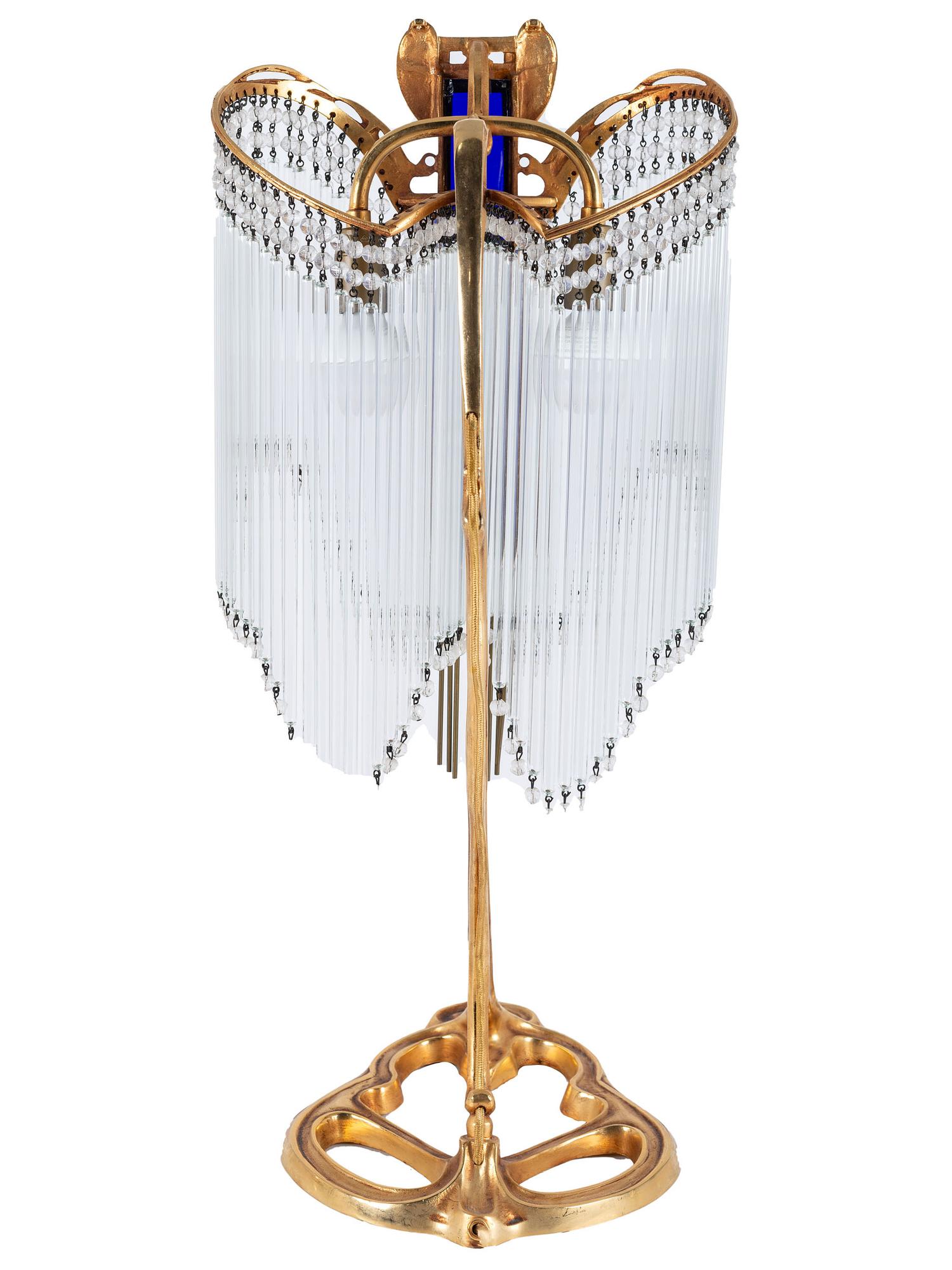 An Art Nouveau Gilt Metal and Glass Table Lamp, after Hector Guimard