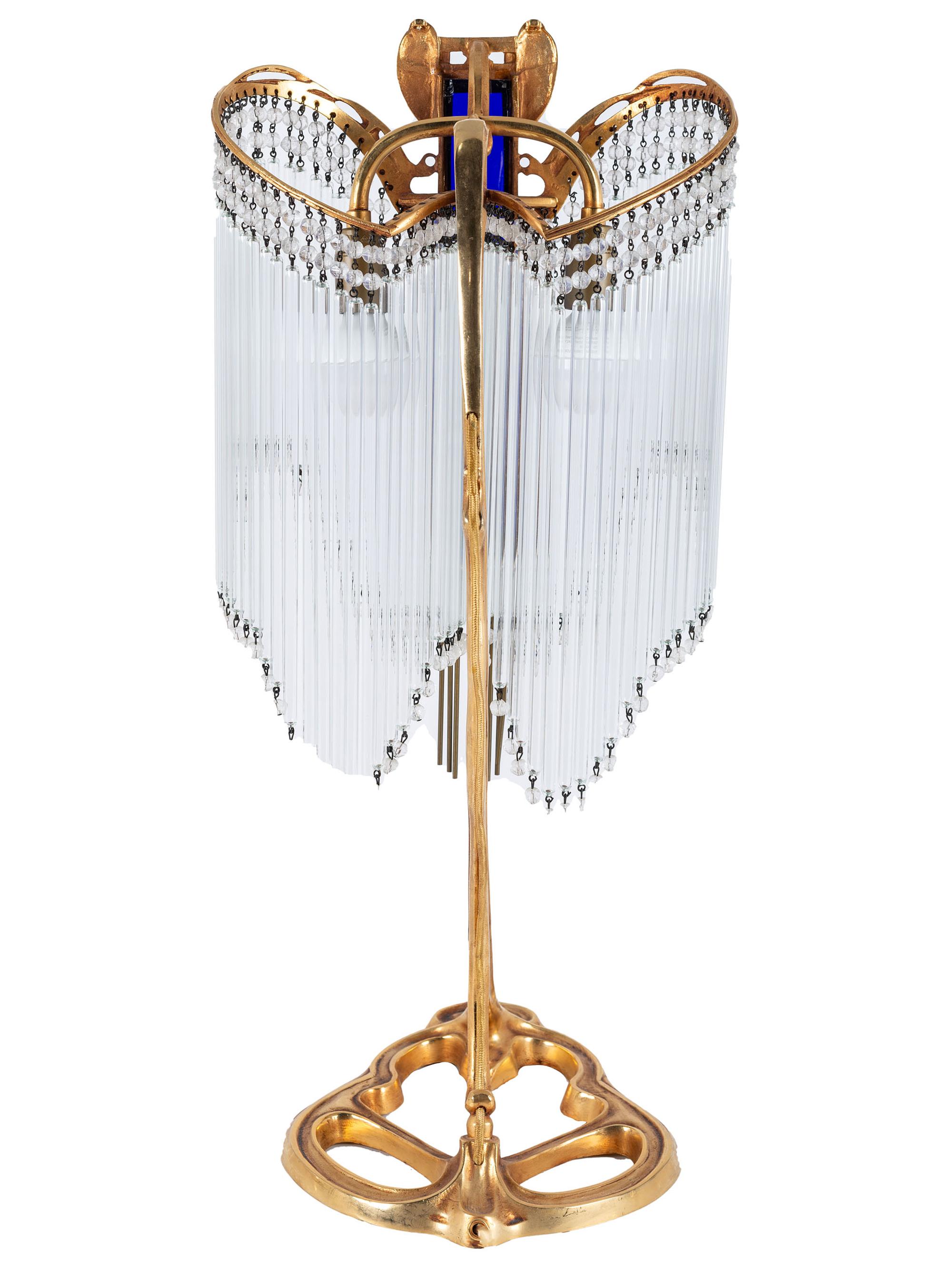 An Art Nouveau Gilt Metal and Glass Table Lamp, after Hector Guimard