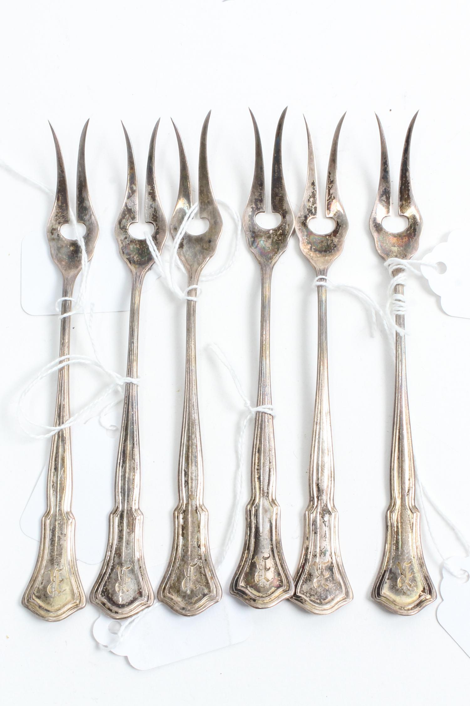 A Set of Six American Silver Two-Prong Butter Picks, R. Blackington & Co., North Attleboro, MA, Alden pattern, the handled all engraved