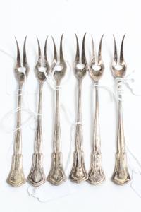 A Set of Six American Silver Two-Prong Butter Picks, R. Blackington & Co., North Attleboro, MA, Alden pattern, the handled all engraved