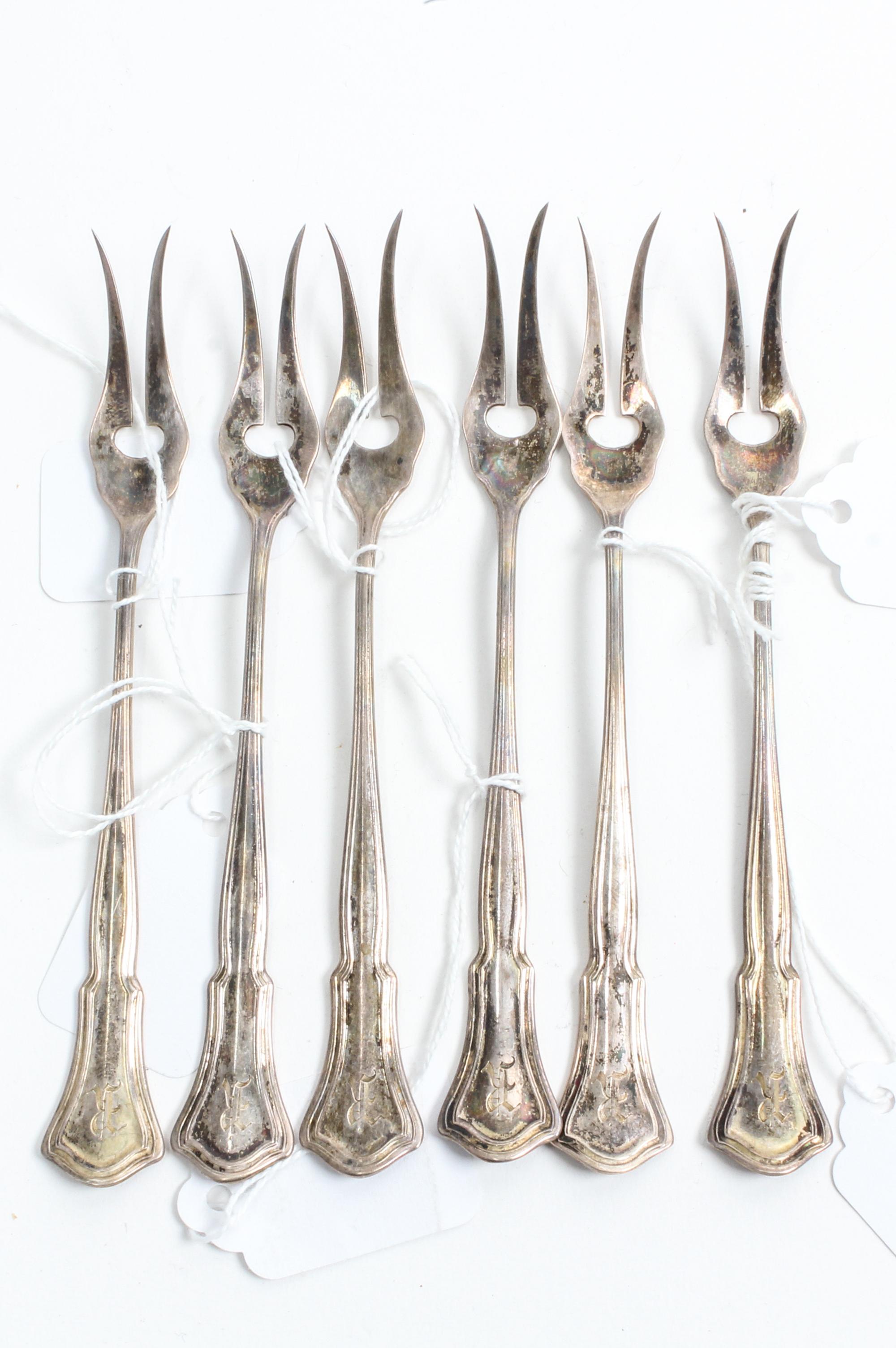 A Set of Six American Silver Two-Prong Butter Picks, R. Blackington & Co., North Attleboro, MA, Alden pattern, the handled all engraved