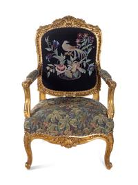 A Pair of Louis XV Style Carved Giltwood Fauteuils