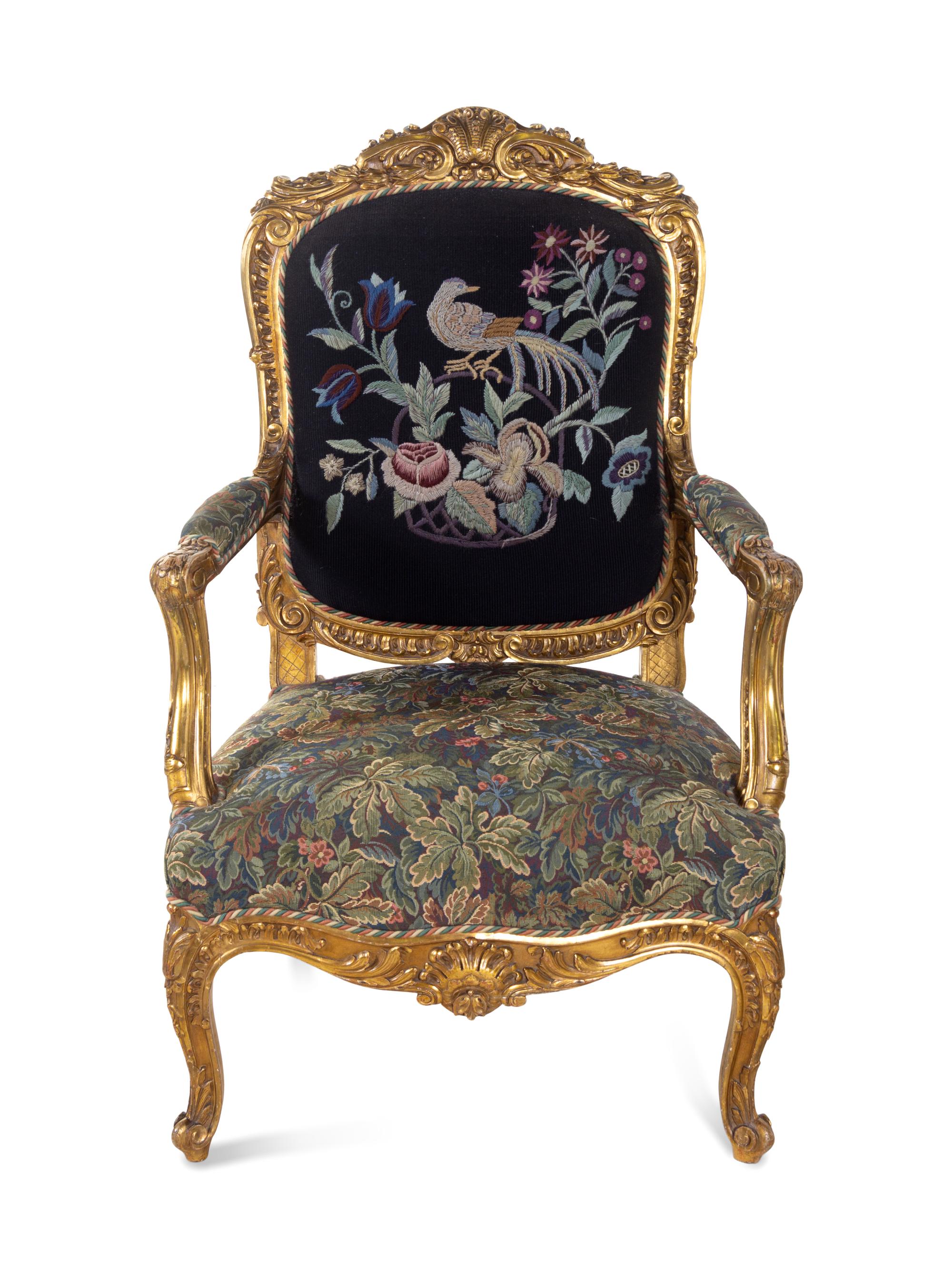 A Pair of Louis XV Style Carved Giltwood Fauteuils