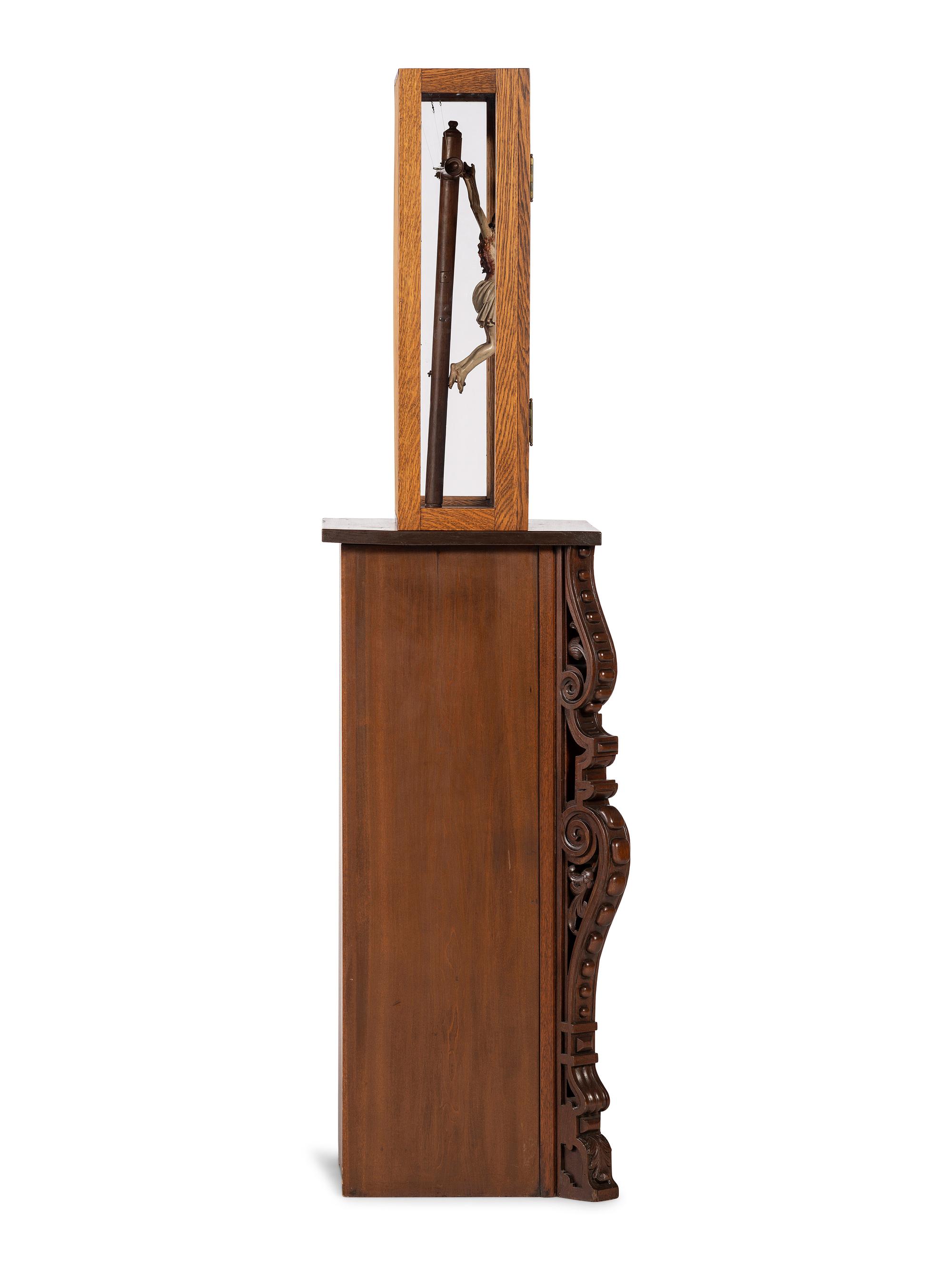 A Spanish Colonial Carved and Painted Wood Crucifix
