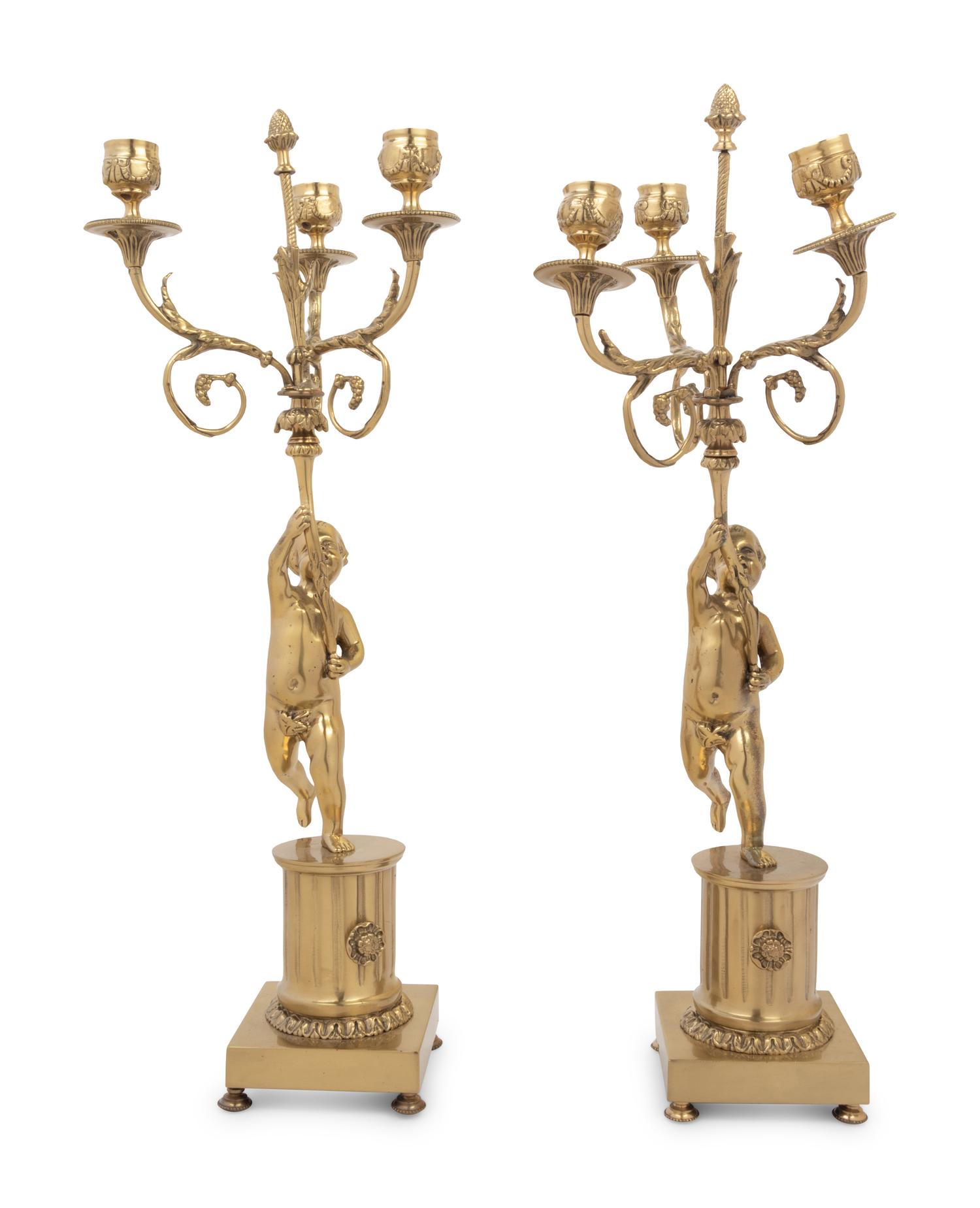 A Pair of Louis XV Style Gilt Metal Three-Light Candelabra
