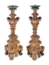 A Pair of Italian Baroque Gilt and Polychromed Pricket Sticks
