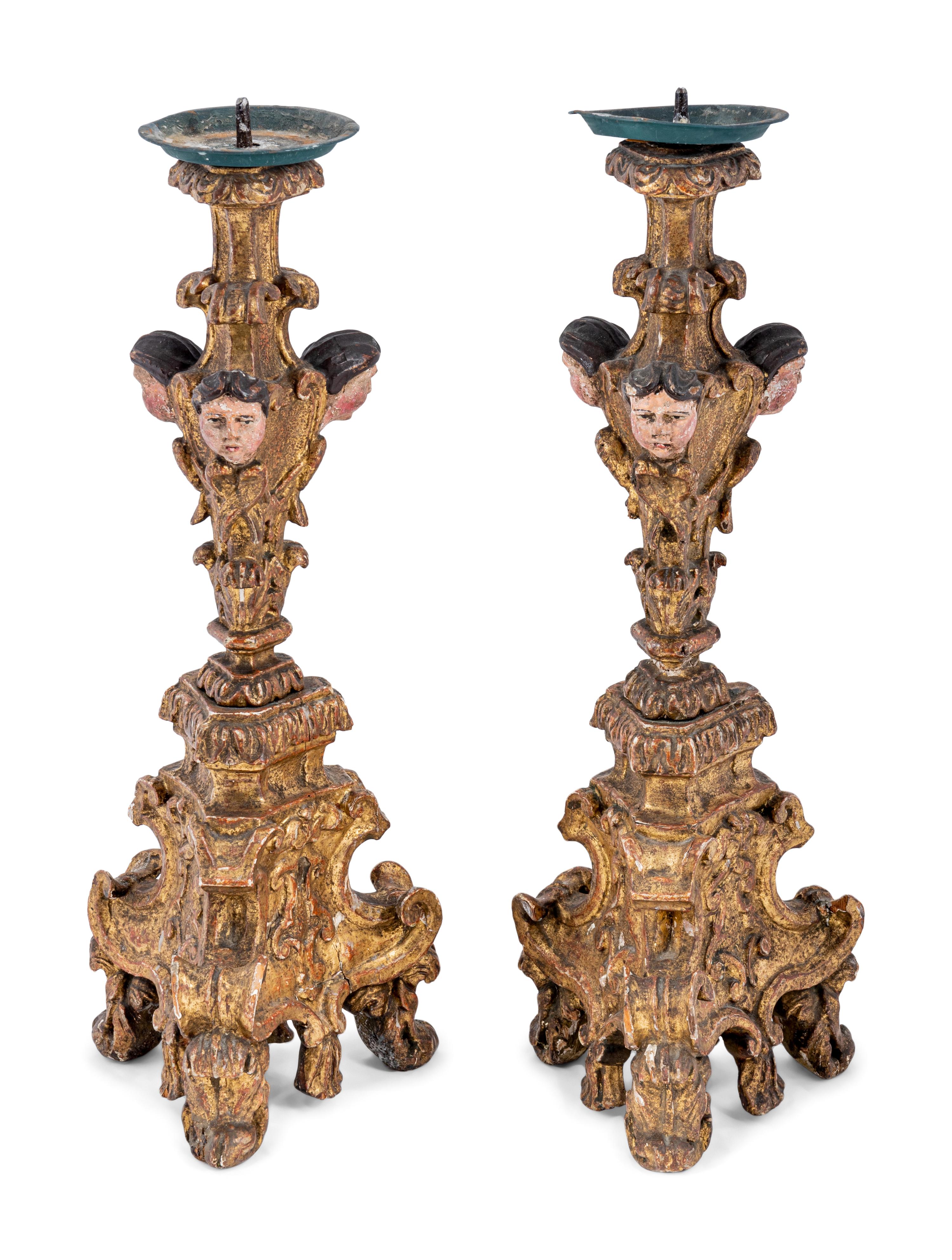 A Pair of Italian Baroque Gilt and Polychromed Pricket Sticks