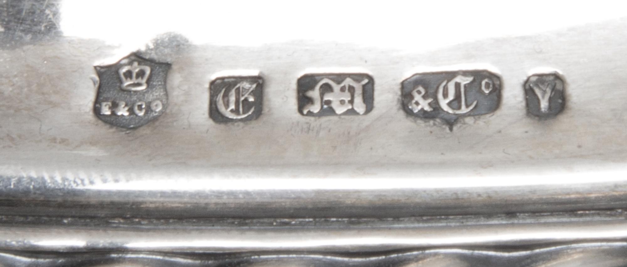 An English Silver-Plate Cloche and Tray, Elkington Silver Co., Birmingham, each of oval form, the handled tray centered with a crest fe