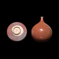 A Chinese Teardrop-Form Porcelain Vase and a Red Glazed Dish, Possibly Jin Dynasty and Later 金或更晚 紅釉瓶及碟