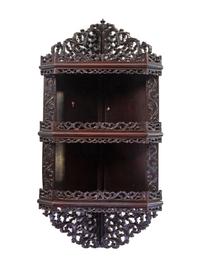 A Chinese Export Hardwood Hanging Corner Shelf