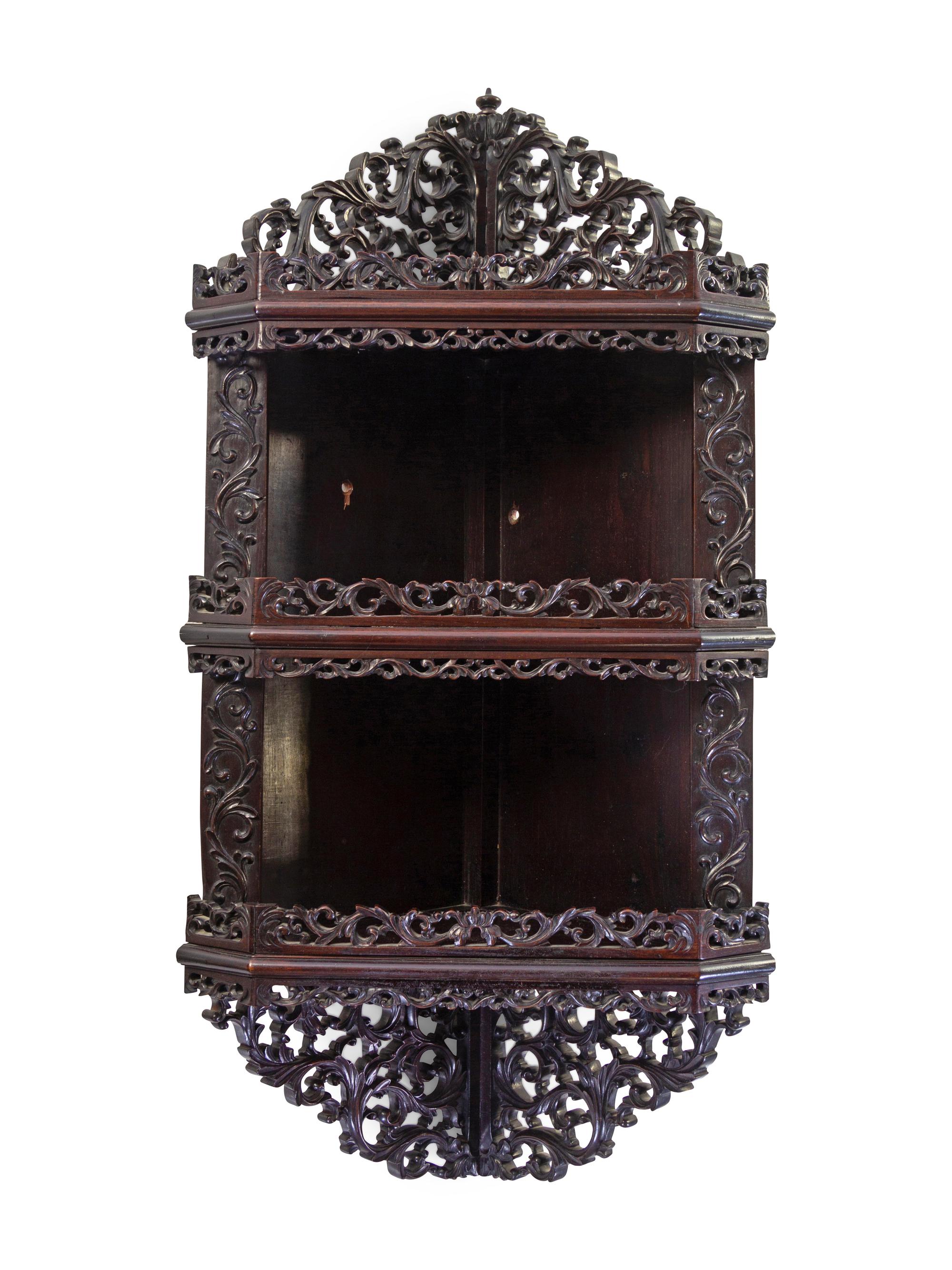 A Chinese Export Hardwood Hanging Corner Shelf