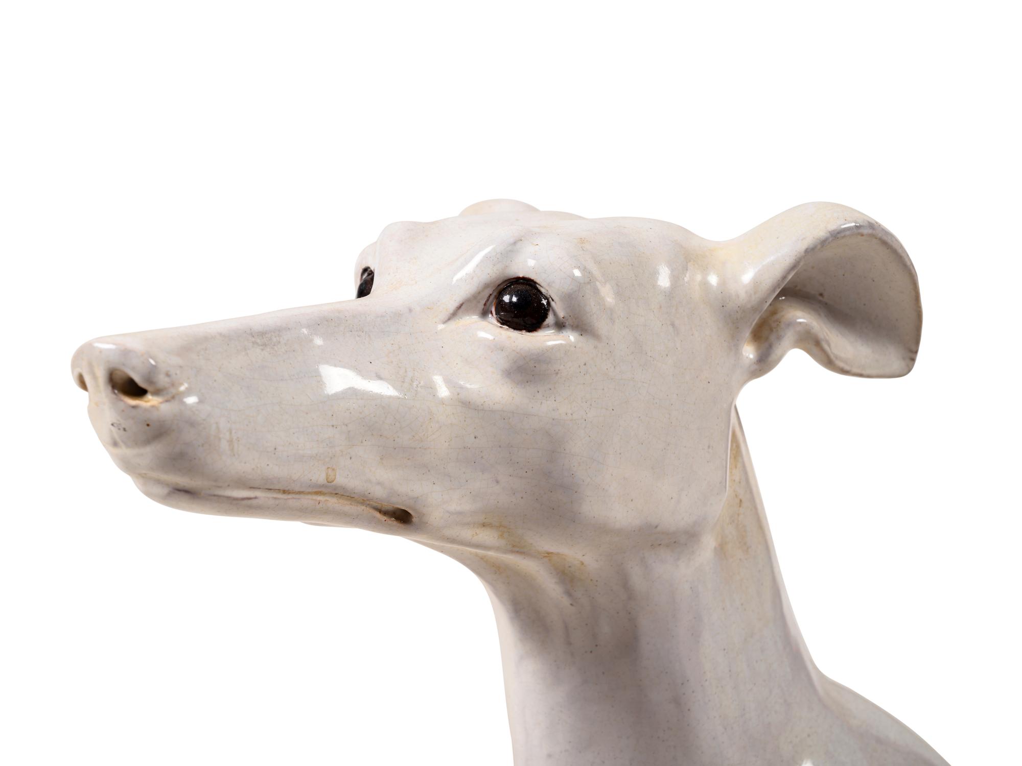 A White Glazed Terra Cotta Whippet