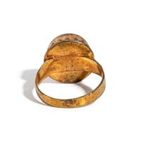 A Near Eastern Banded Agate Cabochon — Set in a gold ring