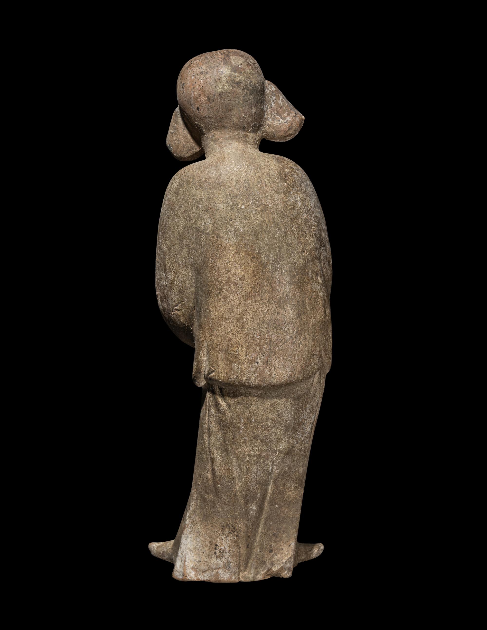 A Chinese Painted Pottery Figure of a Court Lady