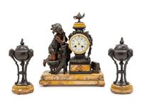 A French Patinated Metal and Marble Three-Piece Clock Garniture