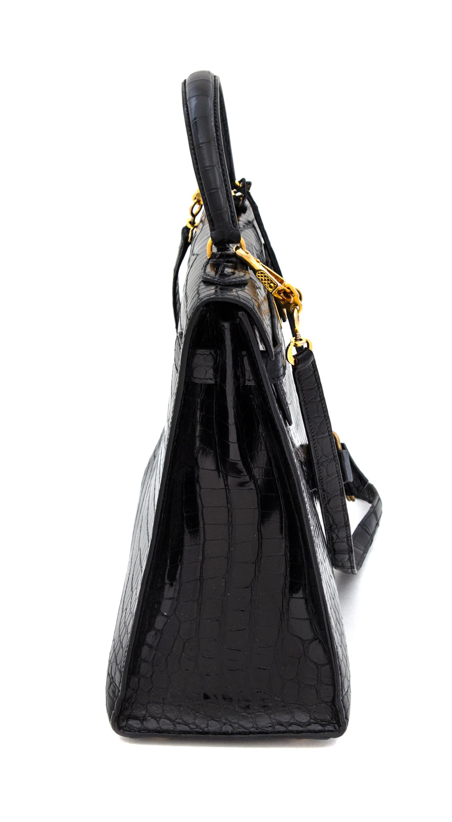 An Hermes 32cm Black Porosus Crocodile Kelly Bag, 12" x 9.5" x 4.5".
