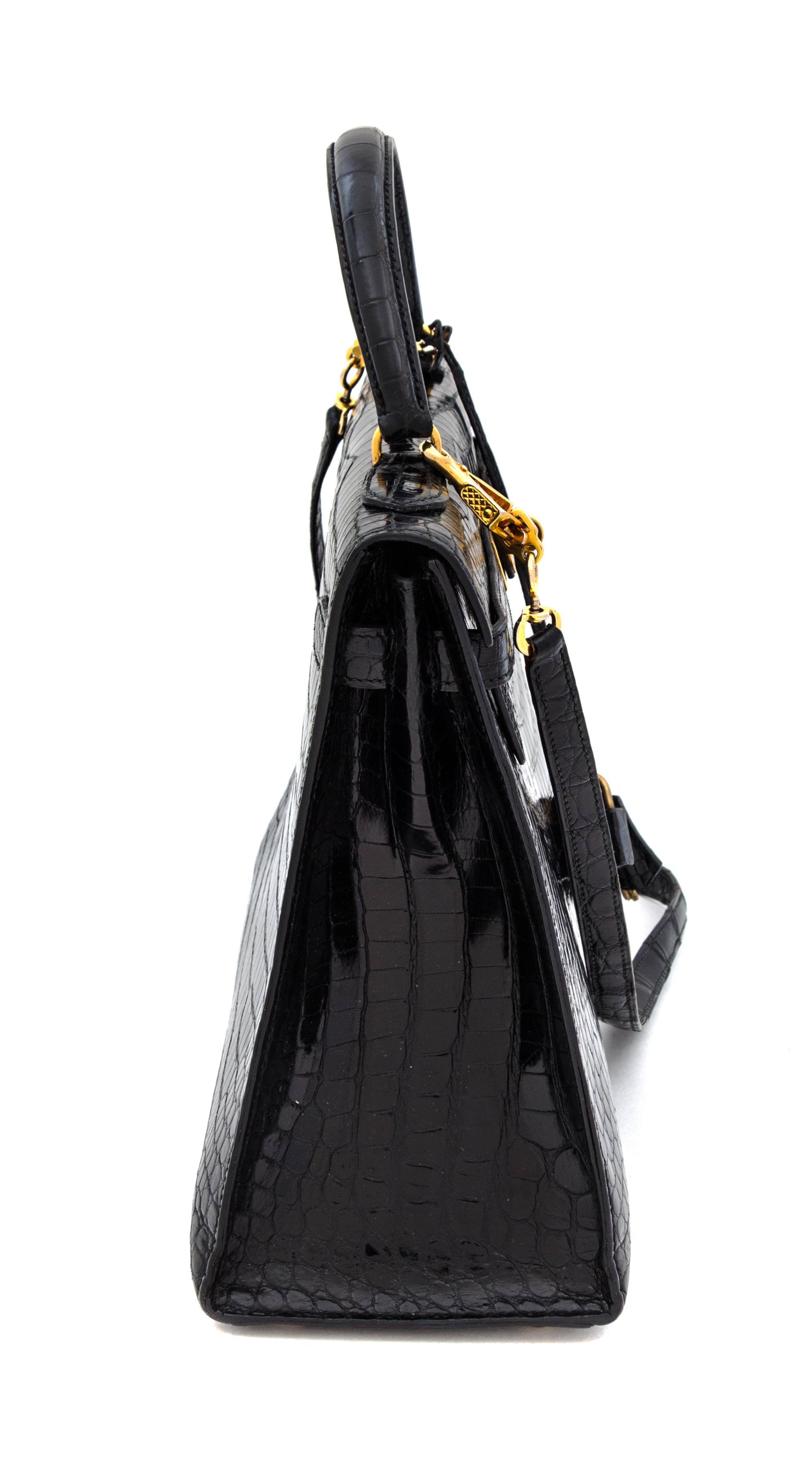 An Hermes 32cm Black Porosus Crocodile Kelly Bag, 12" x 9.5" x 4.5".