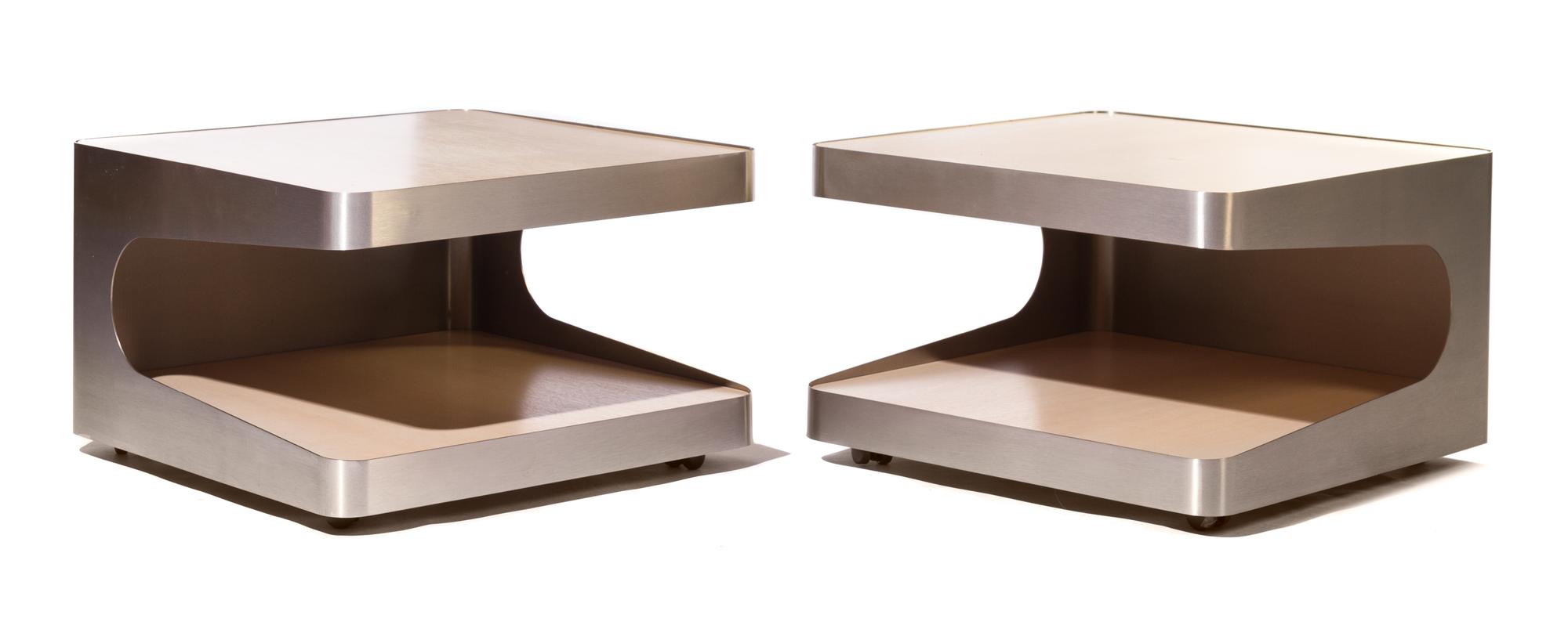 A Pair of Modernist Aluminum Side Tables Height 16 x width 26 x depth 26 inches.