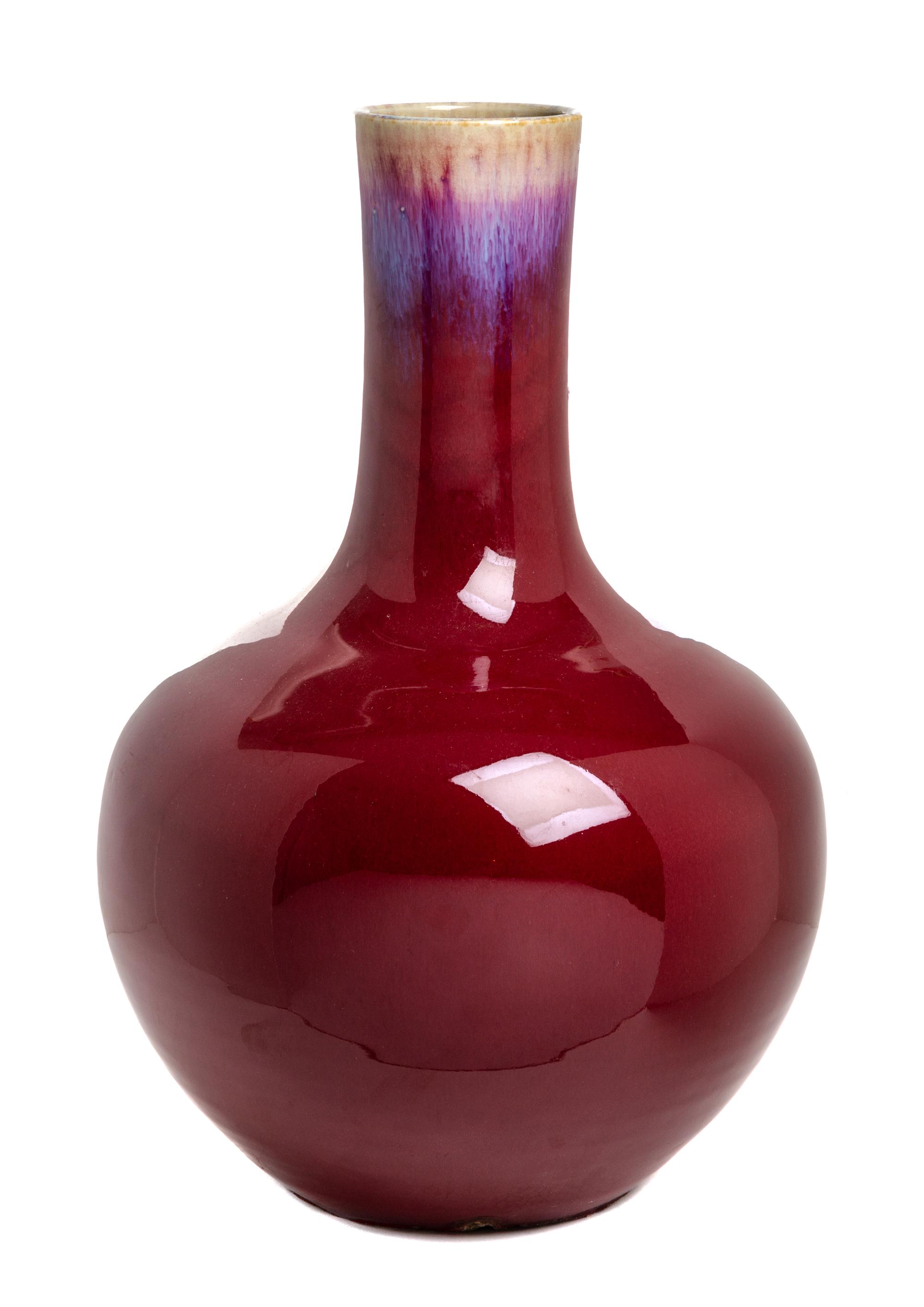 A Chinese Sang de Boeuf Porcelain Vase Height 22 1/2 inches. — 20TH CENTURY