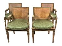 A Set of Four Louis XVI Style Green-Painted and Parcel-Gilt Fauteuils Height 32 inches. — LATE 19TH/20TH CENTURY
