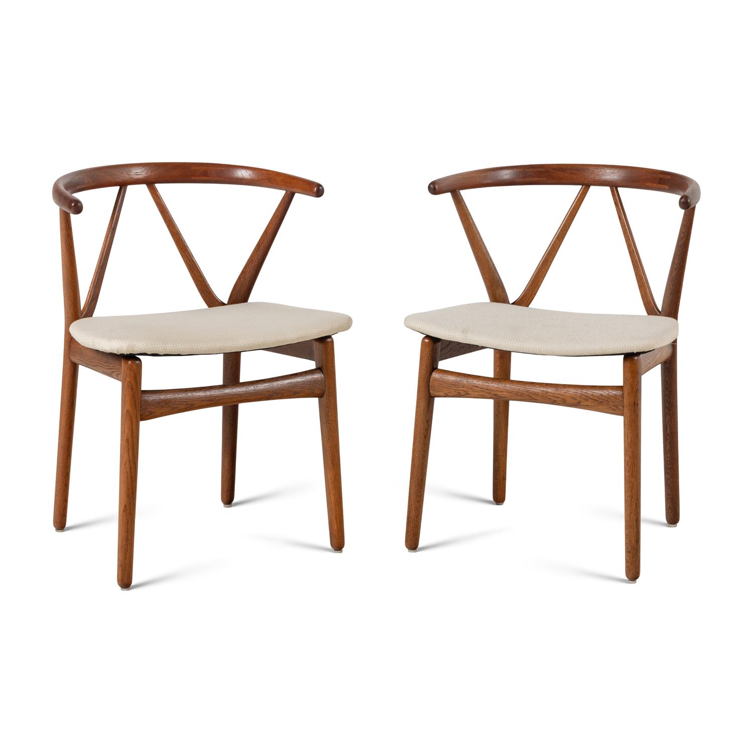 Two Henning Kjaernulf Model 225 Chairs