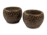 A Pair of Celtic Style Carved Stone Jardinieres